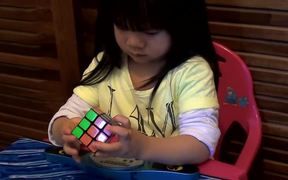 2 Year Old Girl Solves Rubiks Cube