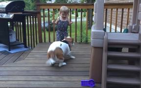 Toddler And Dog Dancing On Deck - Animals - VIDEOTIME.COM