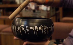 Close-Up Shot of a Singing Bowl in Use - Fun - VIDEOTIME.COM