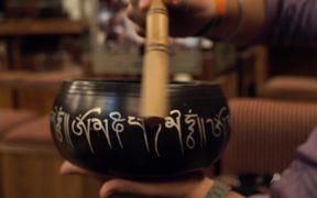 Close-Up Shot of a Singing Bowl in Use