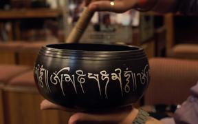 Close-Up Shot of a Singing Bowl in Use - Fun - VIDEOTIME.COM