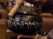 Close-Up Shot of a Singing Bowl in Use