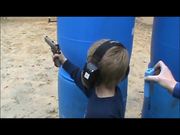 Little Boy Shoots with a Real Gun