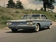 Blue 1960 Corvair On The Road