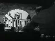 Roy Rogers Shoots The Bad Guy Off A Balcony