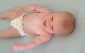 Awesome Baby Dancing Lying in His Bed