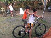 Kids Riding The Bike