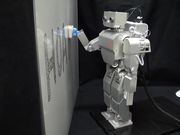 Humanoid robot learns to clean a whiteboard