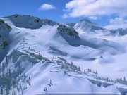 Flying Over Snow Covered Mountains