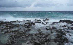 A Choppy Sea Crashing Onto Rocks - Fun - VIDEOTIME.COM