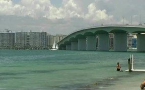 Sailing Under Sarasota Bridge - Fun - VIDEOTIME.COM