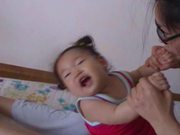Baby Mideum being tickled