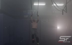 Male Gymnast Practicing on Still Rings