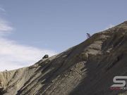Guy Riding Mountain Bike in Slow Motion