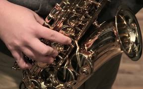 Musician Plays A Gold Saxophone Close Up - Tech - VIDEOTIME.COM