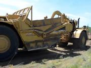 Wheel Tractor-scrapers Conducting Levee Work