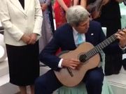 Secretary Kerry Plays Musician's Guitar