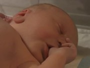 Thumb Sucking Newborn Baby (2h old)