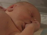 Thumb Sucking Newborn Baby (2h old)