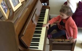 Child Playing the Piano