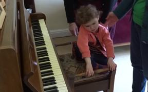 Child Playing the Piano - Kids - VIDEOTIME.COM
