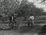 Girls In Orchard With Bikes