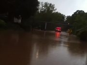 Truck Drives Through 1.5-meter High Flood
