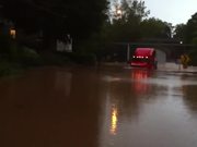 Truck Drives Through 1.5-meter High Flood