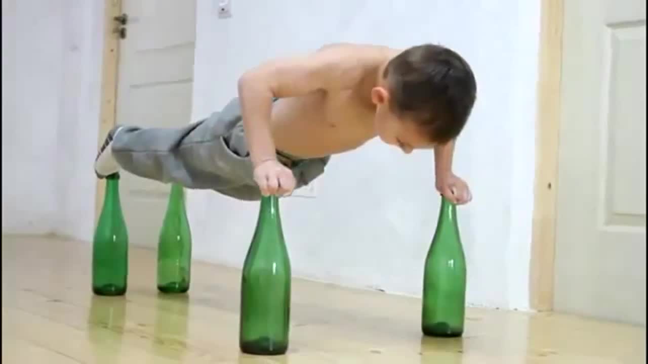 World's Strongest Kid Does Push-Ups On Bottles