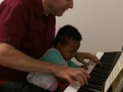 Chris and Augie Playing the Piano